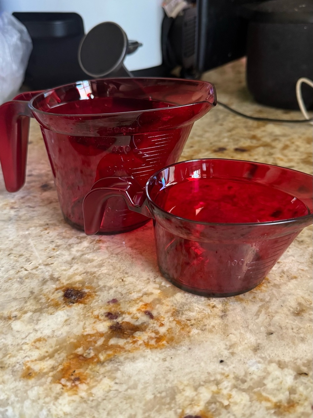 Set of Red Tupperware Measuring Cups